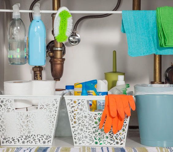 How to organize cleaning supplies under the bathroom sink.