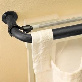 Instantly hang a second panel behind existing curtains using a bungee cord