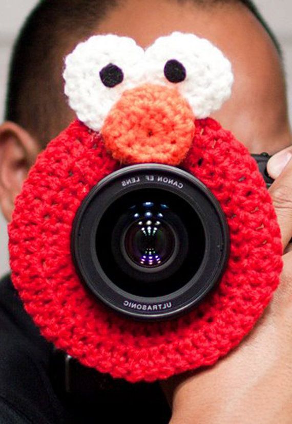 "Lens Buddy" Elmo!!!  AHHH!!!  Too cute!  A must have for us child pho