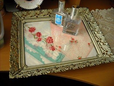 Put vintage hankies in an old frame for a dresser or serving tray.