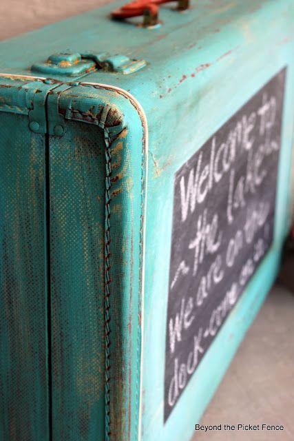 Repurpose an old suitcase — welcome sign