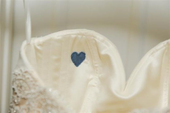 "Something Blue"- heart sewn into wedding dress made from her dad'