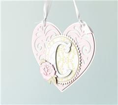 This pretty wall hanging would be perfect for a little girl’s room.