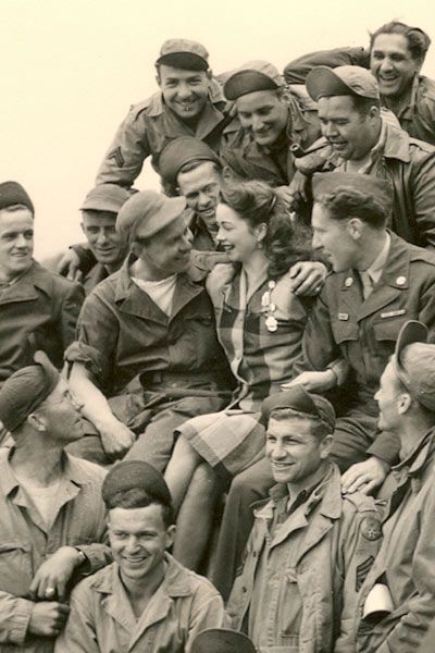 World War II Pin-up girl Margie Stewart visiting troops in Reims, France in June