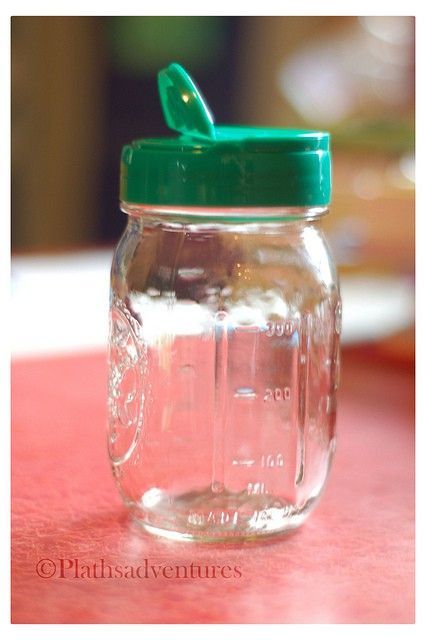 a lid from parmesan cheese fits on a mason jar. amazing. this website has a craz