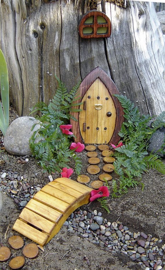 how cute is this?!? a miniature garden fairy door and pathway to put on an exist