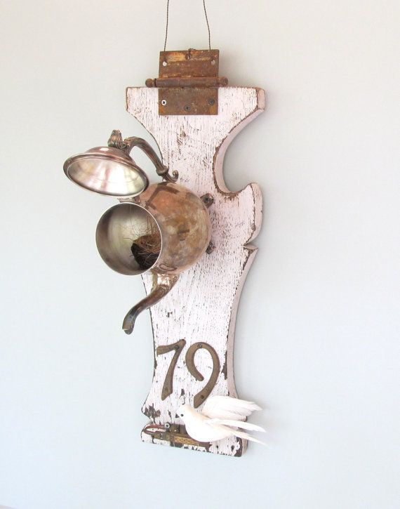 my new project:   birdhouse on old wood piece with perch and house numbers