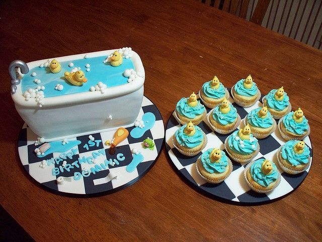 Amazing rubber duckie cake and cupcakes.