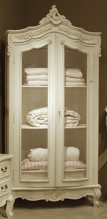 Beautiful armoire with wire mesh doors