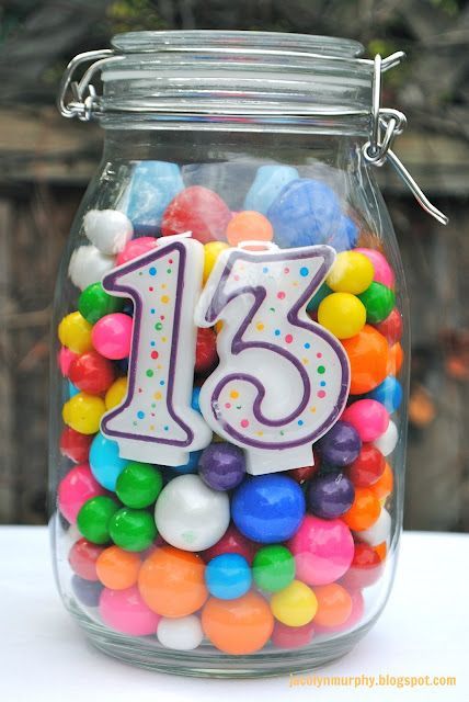 Birthday centerpiece idea for any age — tie balloons on top–fill with any cand