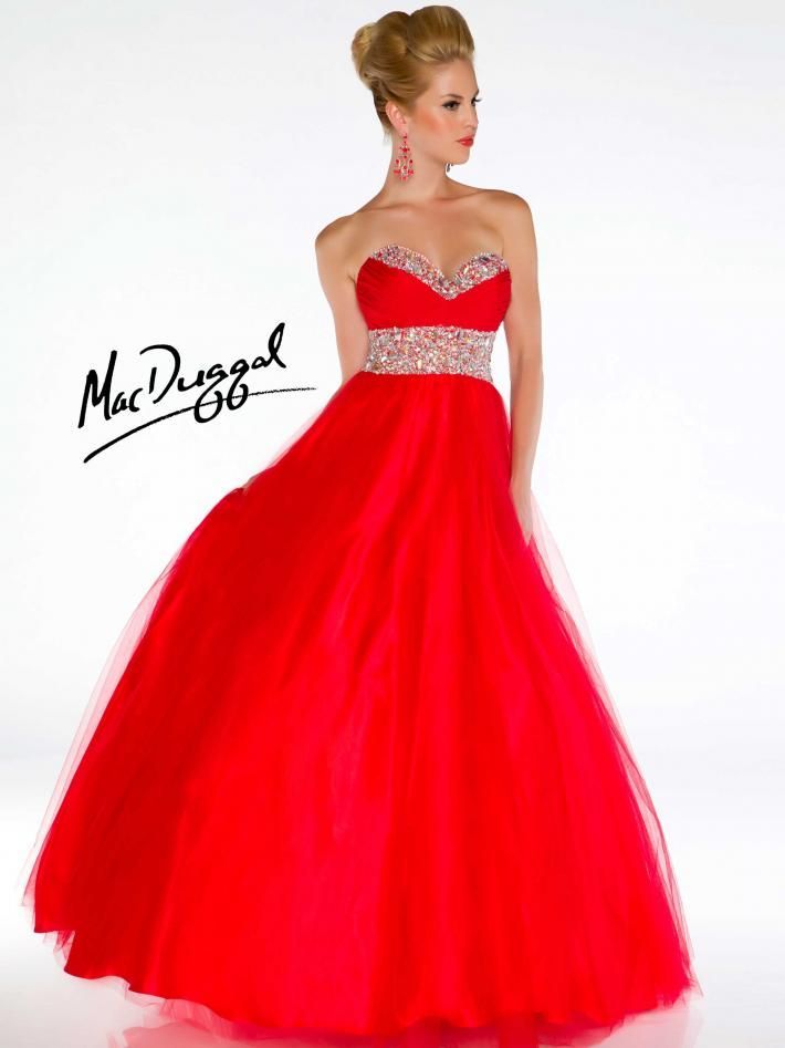 Check out this stunning ballgown from MacDuggal in red and purple. Available at