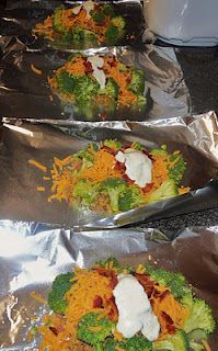 Chicken, broccoli, ranch, cheese, and bacon in aluminum foil and placed in the o
