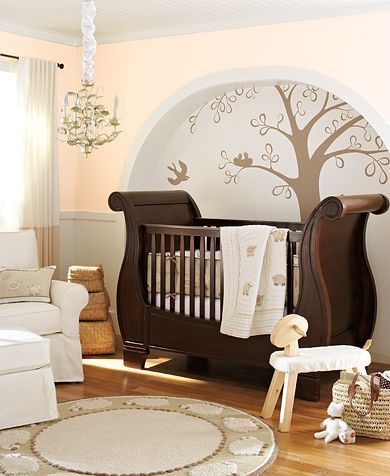 Crib has a shape similar to a boat and use the dark brown color. And the color i