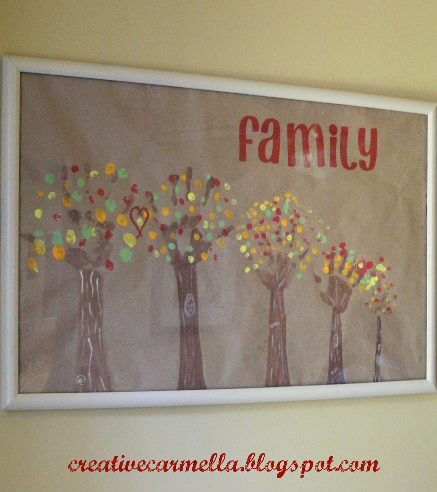 Family Trees: Arms/Hands in brown paint are the trees finger prints in colored p