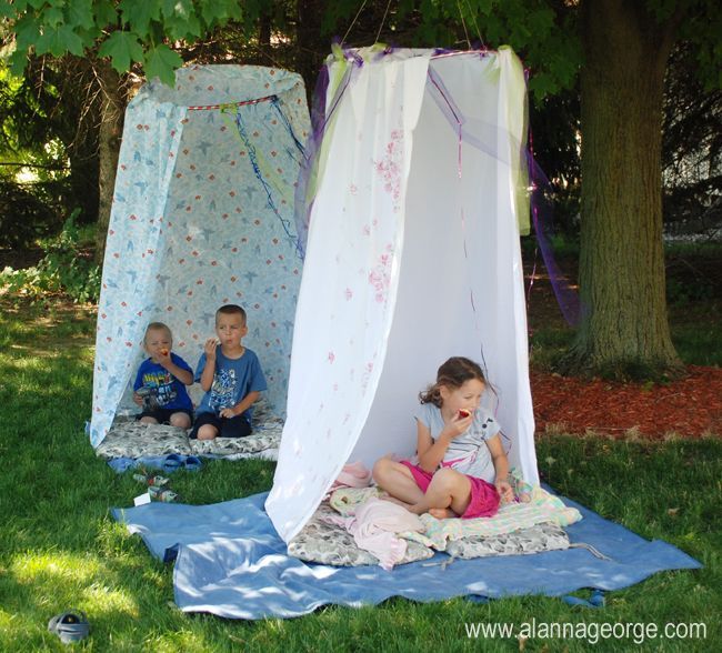 Fort made from hula-hoop and shower curtain, just hook the rings on the hoop.