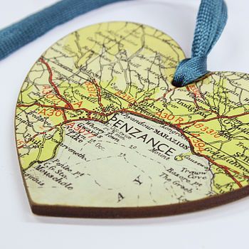 Map ornaments from family vacations – put the dates on the back.