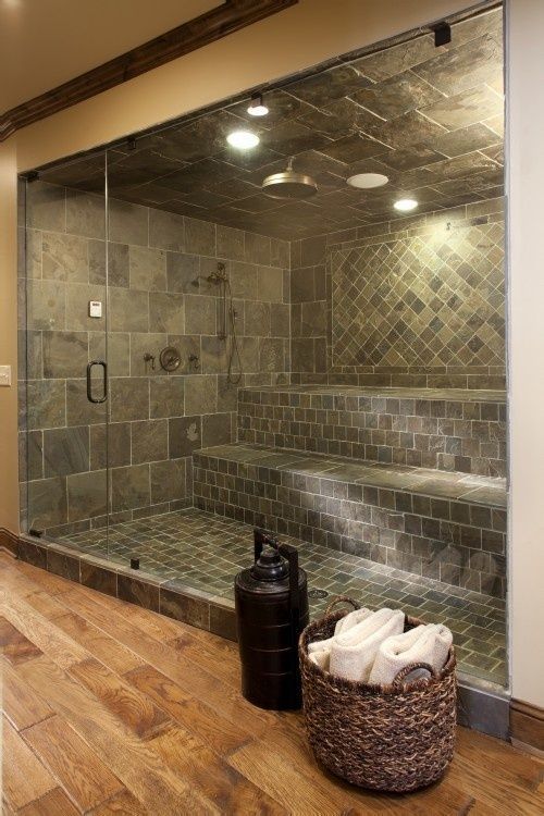 Master Shower with an added waterfall that then turns into a sauna.