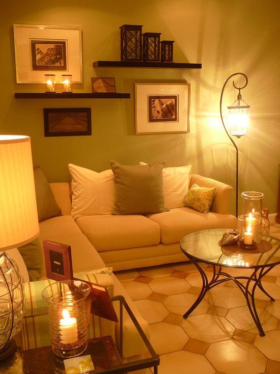 Shelves over couch with pictures. Love the set up.