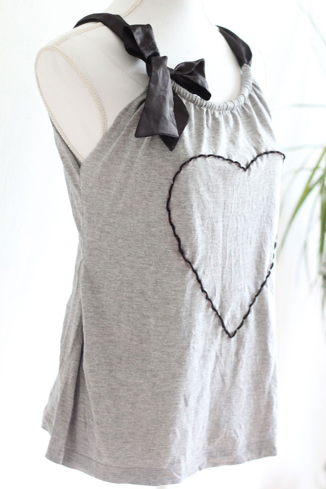 Upcycle tshirt into ribbon tank top- would look really cute with a fancy pink ri