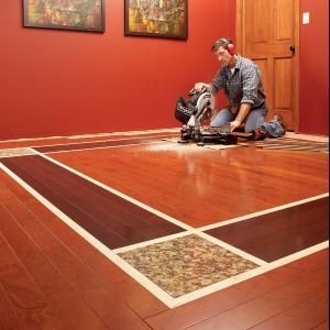 You can mix and match colors of wood laminate flooring to create a showstopping