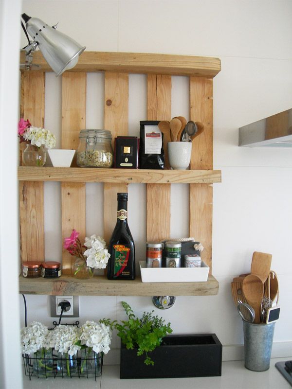 an old crate stand turned upside down and hung on the wall for instant shelving