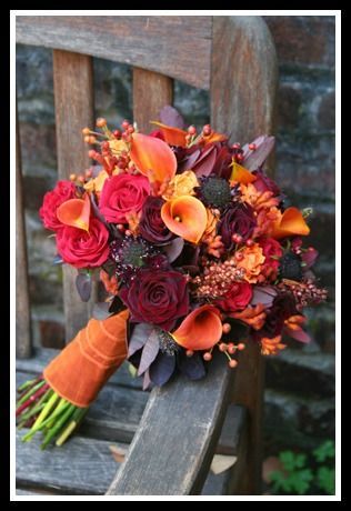 Autumn wedding bouquet, in shades of orange, red, burgundy and rust, calla lilie