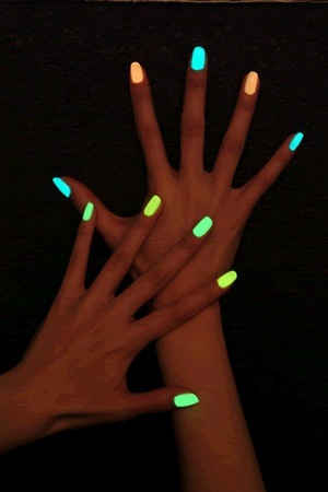 Break a glow stick and put it in a clear nail polish.