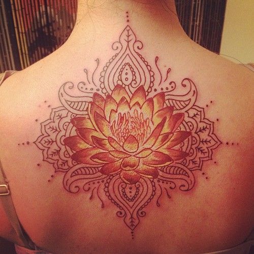 Lotus tat on the back