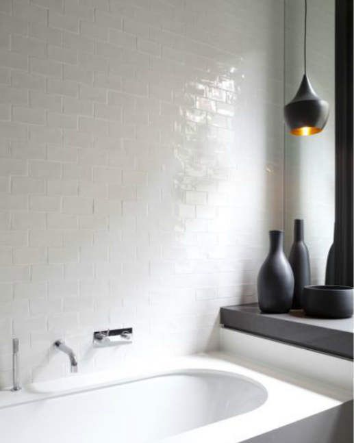 Love the simple white tile & Tom Dixon light for a bathroom!