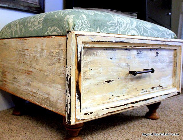 Turning an old drawer into an ottoman with storage!