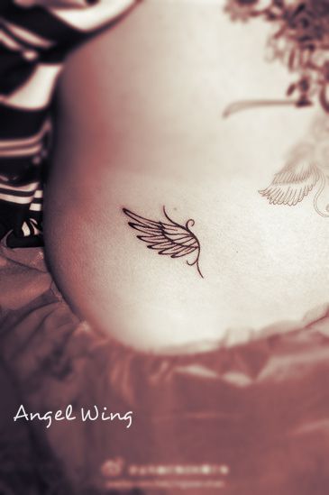 a very concise and elegant angel wing tattoo on the hip #angel #tattoo -would ab