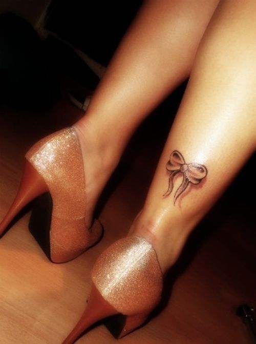 Bow Tattoo. I like this. Hmmmm….. This might be next to hold me over until aft