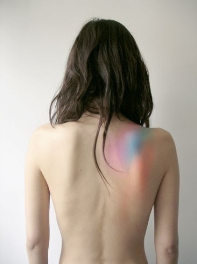 REALLY interesting idea for a tattoo! Colorful, on the shoulder/back. Faded colo
