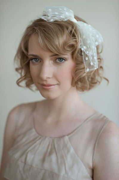 short curly wedding hair…no bow, but headband