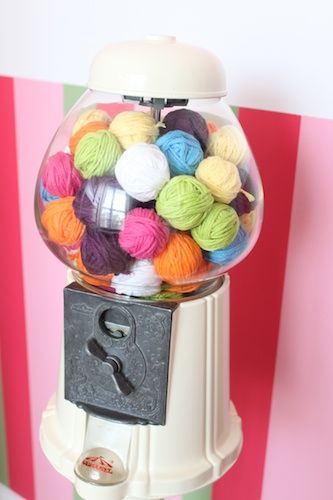 Painted gum ball machine filled with yarn. #crafts #storage #organization #yarn