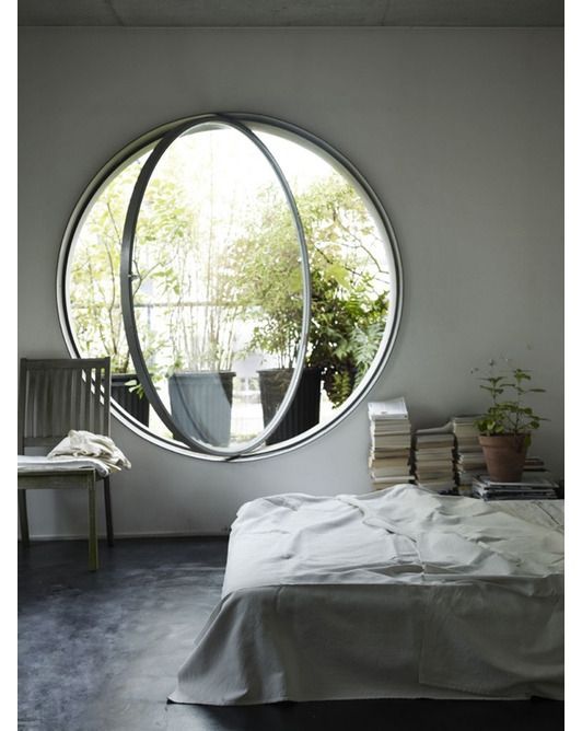 A round window is traditionally referred to as an oculus. They are traditionally