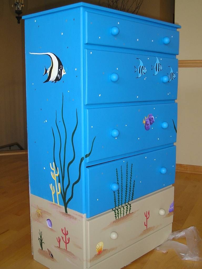 ocean theme nursery ideas | The tropical fish and coral turn his childs dresser