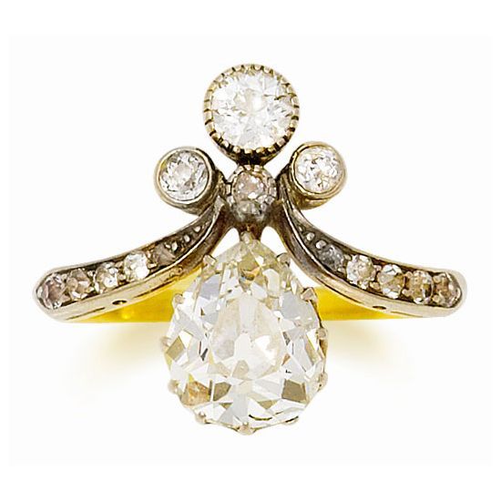 An Edwardian diamond ring, circa 1900    The pear shaped diamond with an old bri