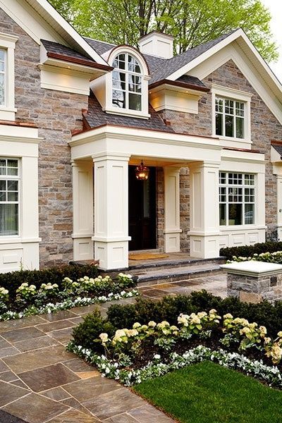 love the stone on the house with white accents. pretty curb appeal.