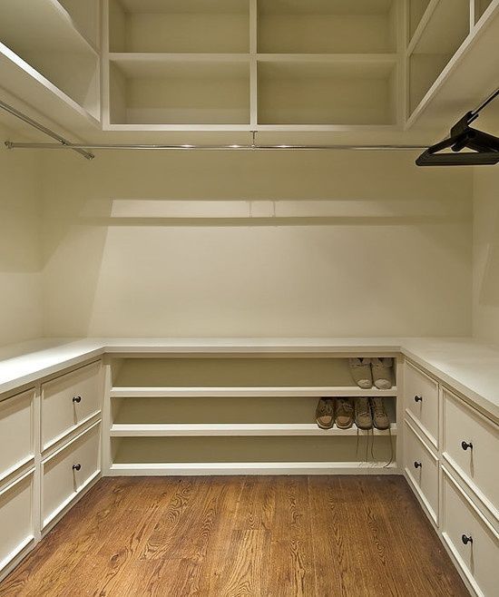 master closet. shelves above, drawers below, hanging racks in middle. – WOW