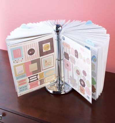 Paper towel holder + binder rings + page covers = a great way to display kids ar