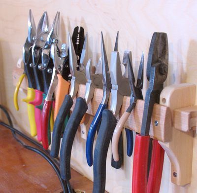 To hold a lot of pliers, its easiest to just hook them onto the edge of a piece