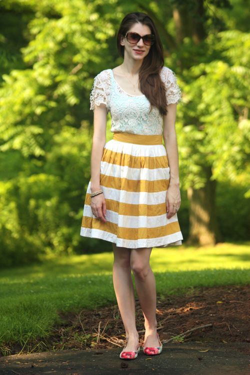 colorblock skirt in mustard with crochet top, mint tank top and floral flats