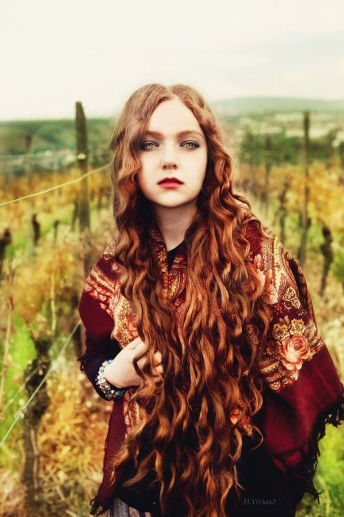 Her hair had the color of polished copper and the look of unraveled ships rope.