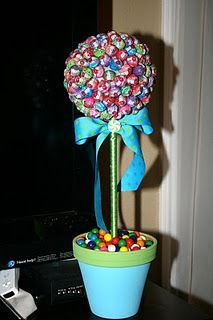 In love with these decorations! Dum Dum bouquet with gumballs in the pot! Too cu