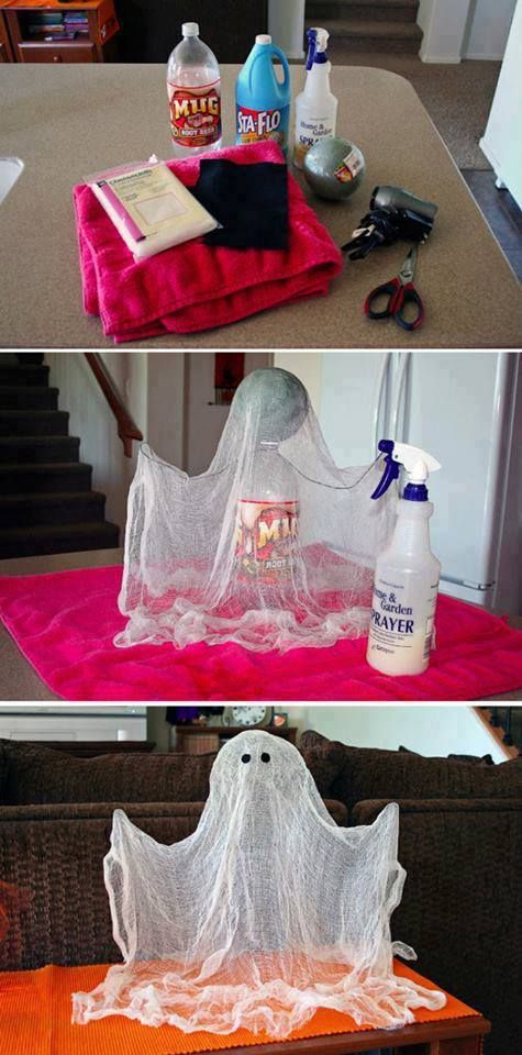 Make the shape with bottle, ball and wire. Drape over cheesecloth and spray with
