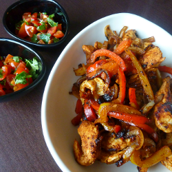 Paleo Chicken Fajitas— Combine peppers, onion, and chicken all cut in long str