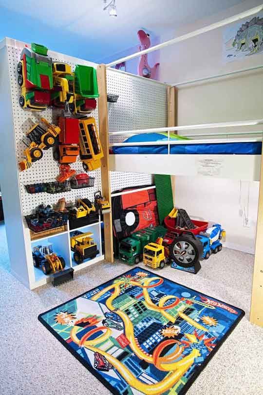 put pegboard on the back of expedit shelving, hang trucks on it!  peluso-two.jpg