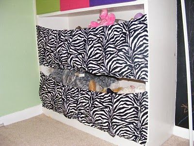 Stuffed Animal Storage :: make a stretchy fabric panel across front of  shelf –