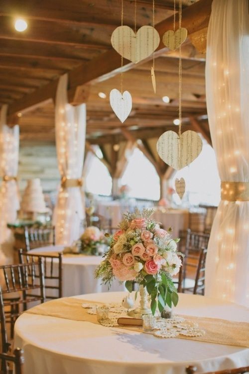 The hearts hanging and the drape with back lighting gives this great dimension.